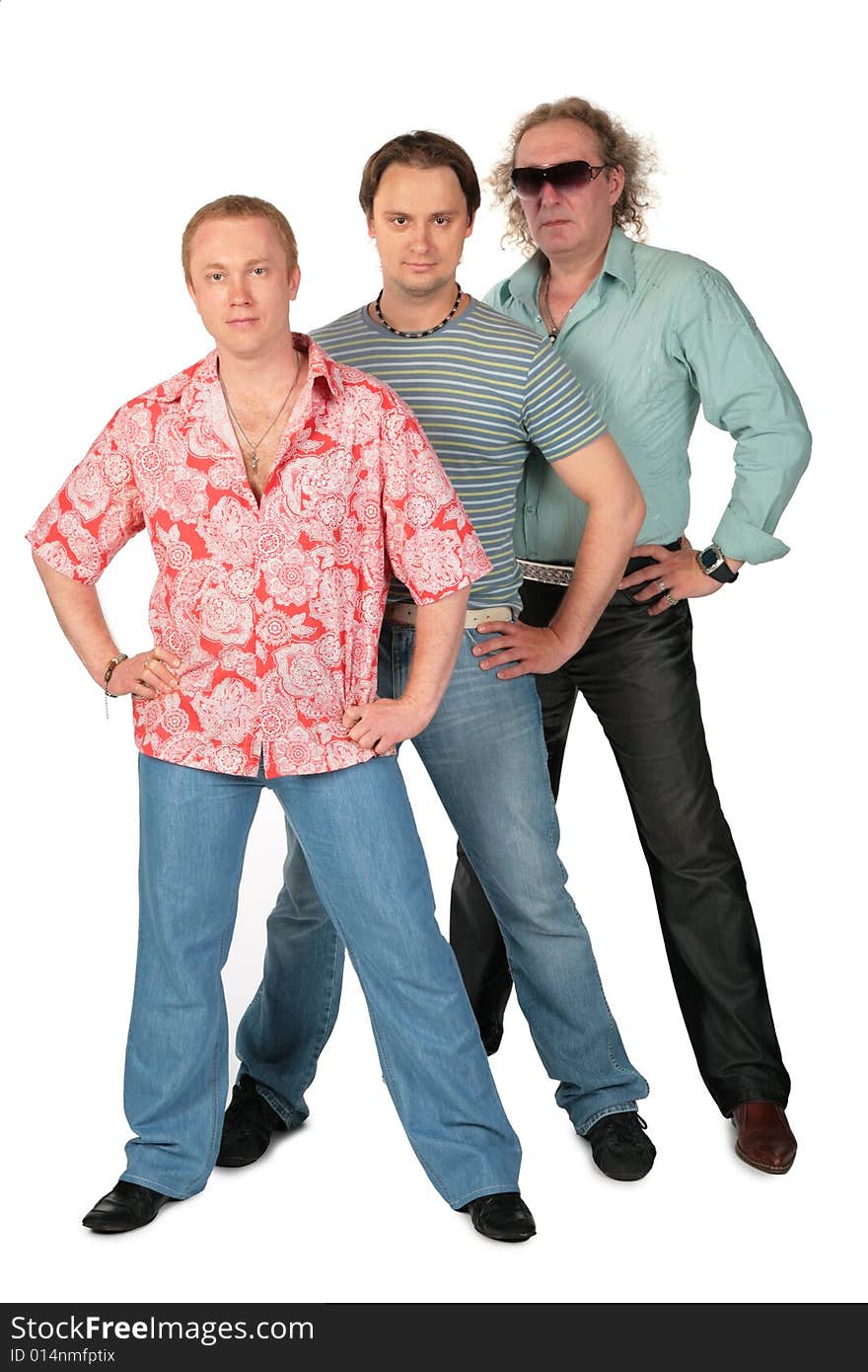 Three standing men. Music group.