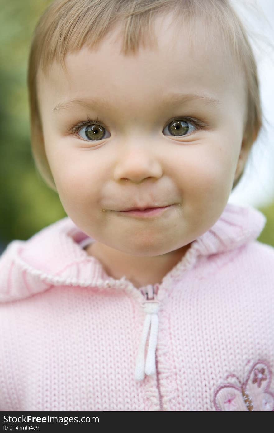 Portrait of happy baby girl in park. Portrait of happy baby girl in park