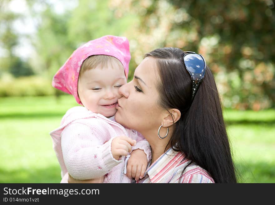 Happy family on green meadow. Happy family on green meadow