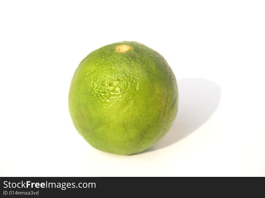 Fresh lime isolated against white