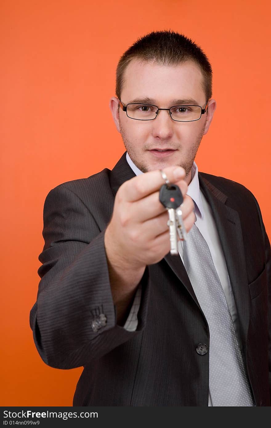 Real estate agent holding keys. Real estate agent holding keys