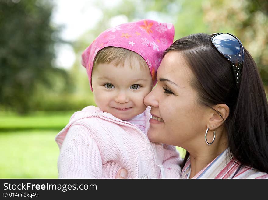 Happy family on green meadow. Happy family on green meadow