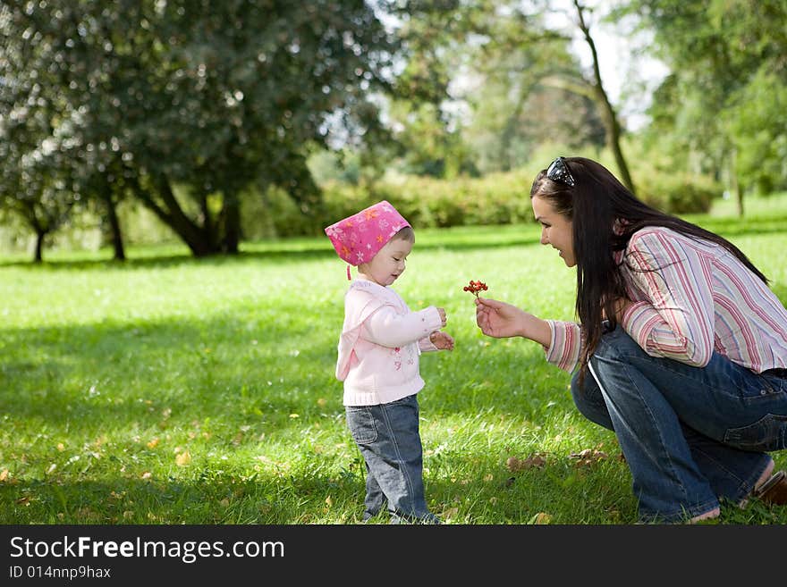 Happy family on green meadow. Happy family on green meadow