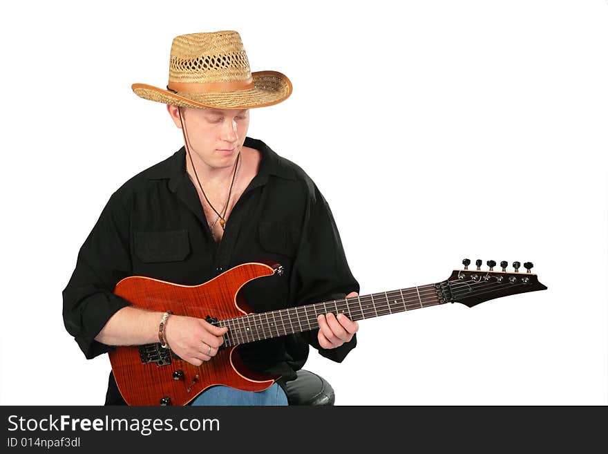 Young Man In Hat Play On Guitar