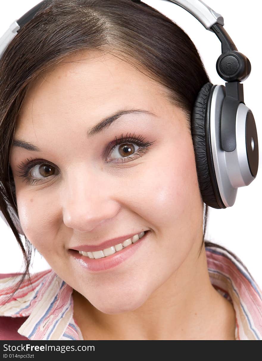 Attractive brunette woman with headphones. Attractive brunette woman with headphones