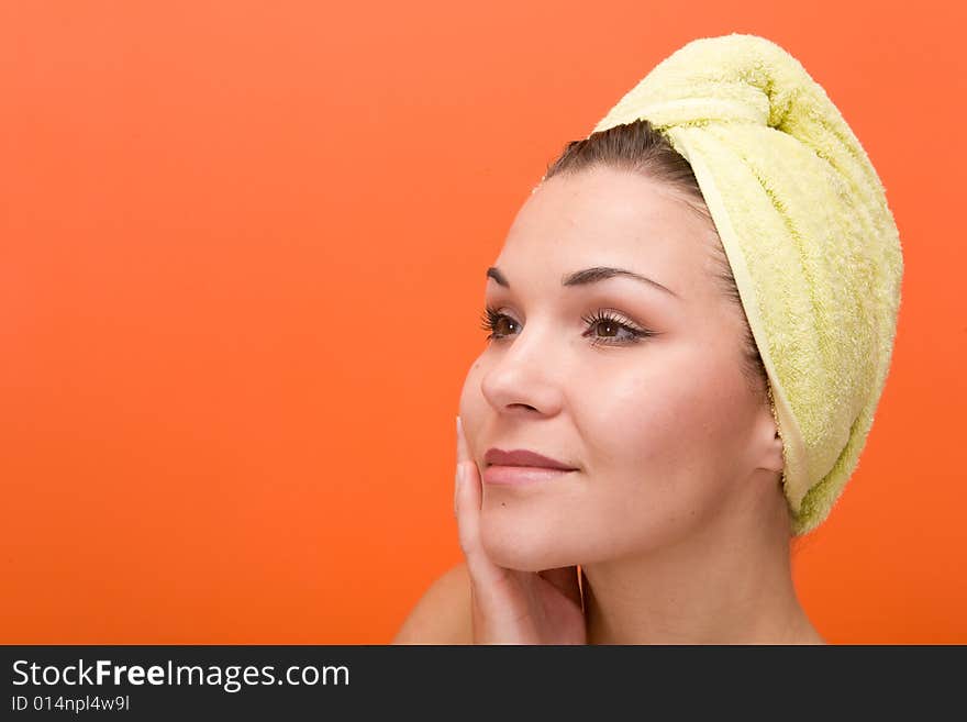 Attractive and fresh brunette woman on orange background. Attractive and fresh brunette woman on orange background