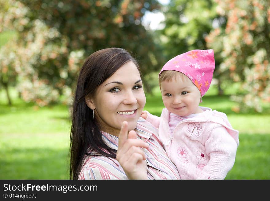 Happy family on green meadow. Happy family on green meadow