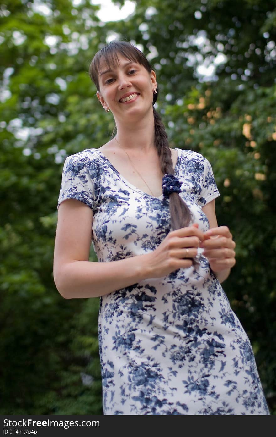 Smiling girl on green background