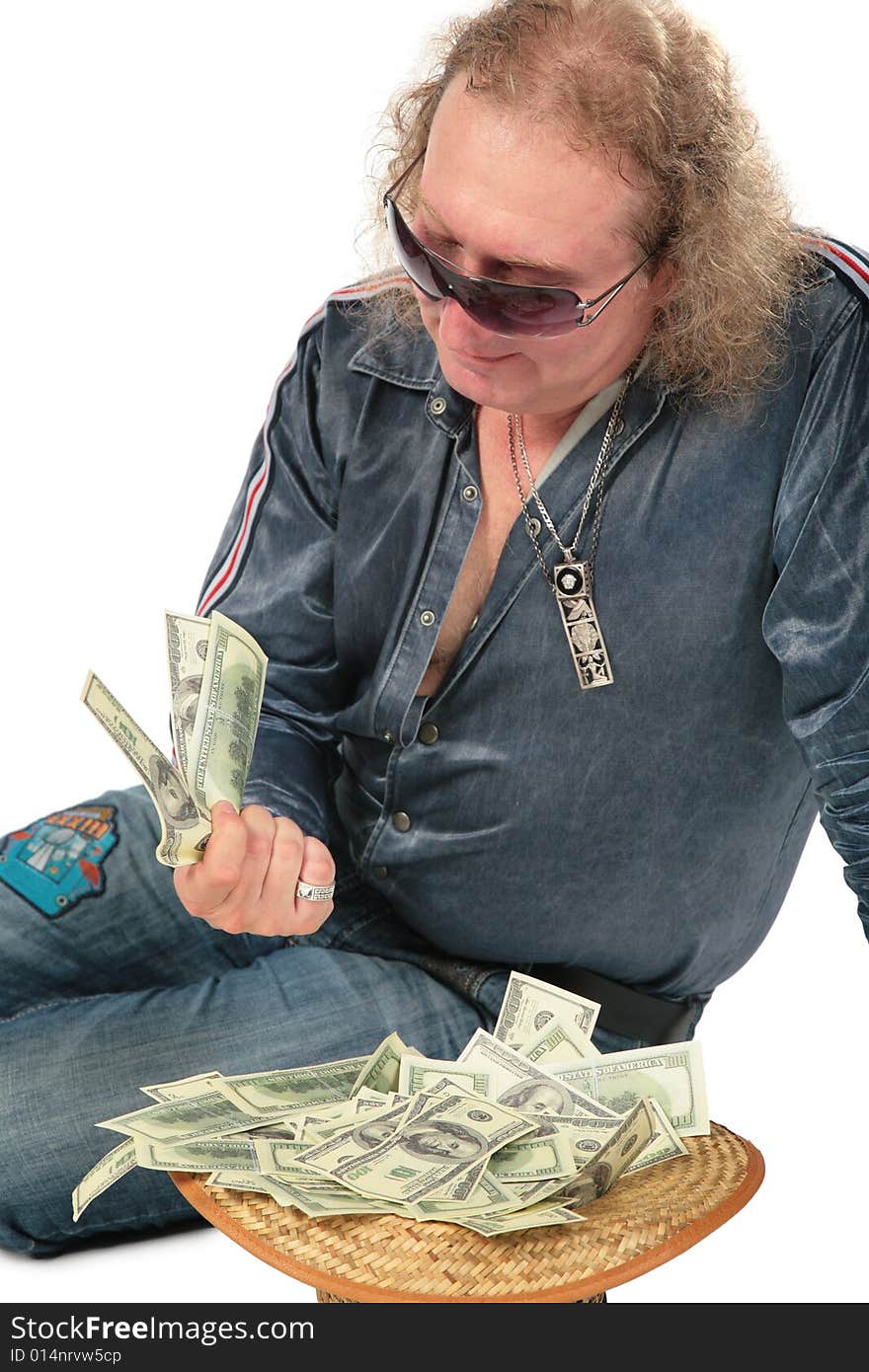 Man in sunglasses with dollars in hat on white