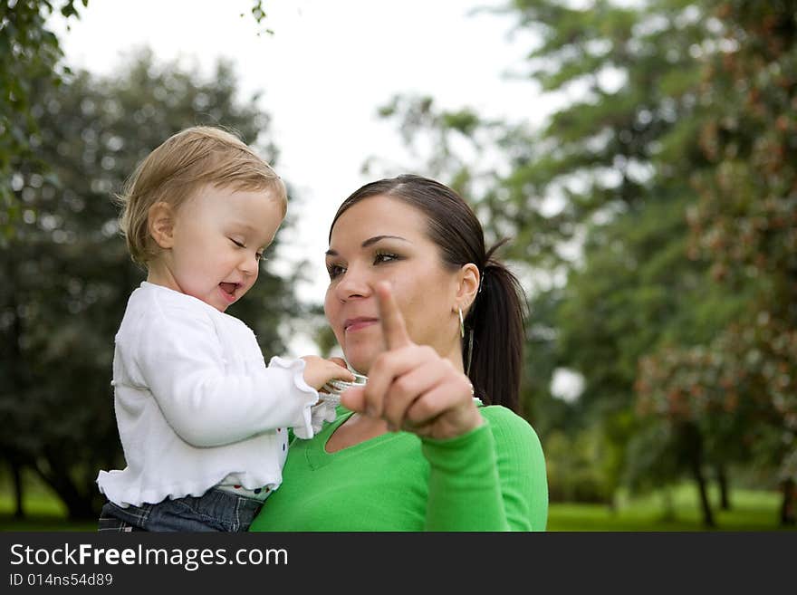 Happy family on green meadow. Happy family on green meadow