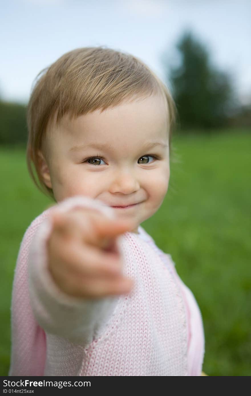 Portrait of happy baby girl in park. Portrait of happy baby girl in park