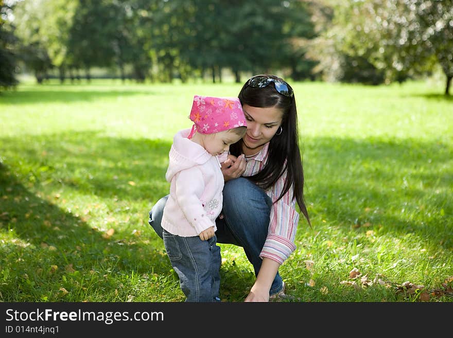 Happy family on green meadow. Happy family on green meadow