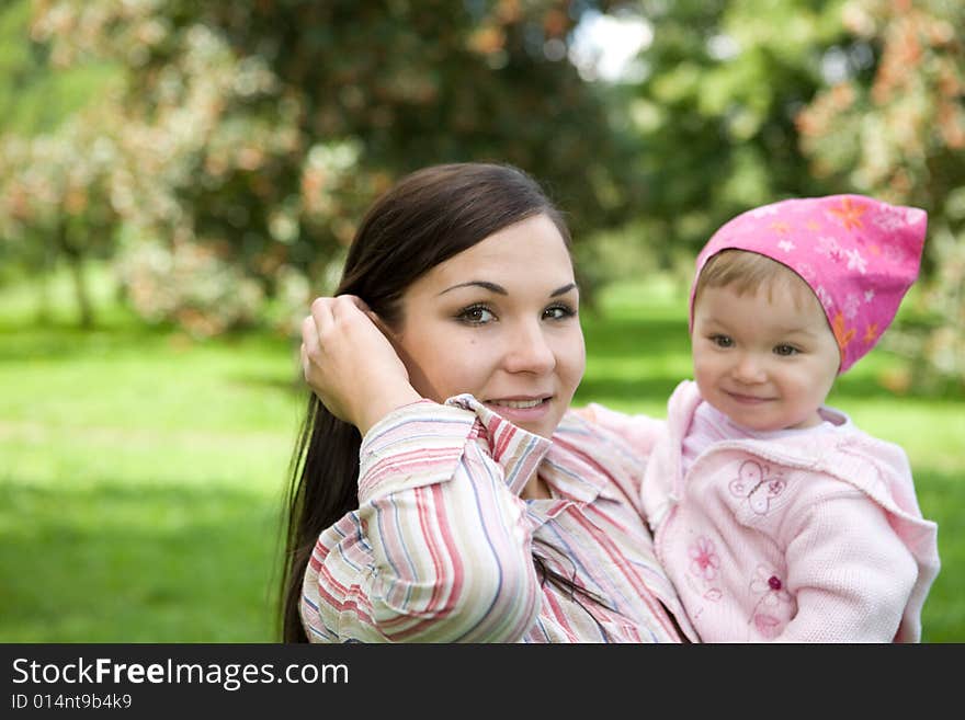 Happy family on green meadow. Happy family on green meadow