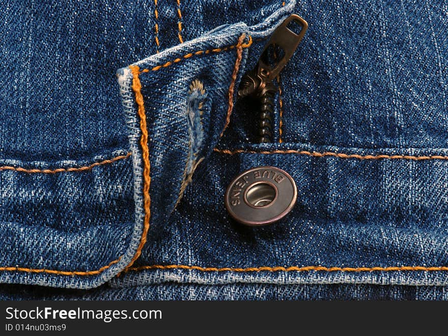 Close-up of Blue Jeans, Button, and Zipper