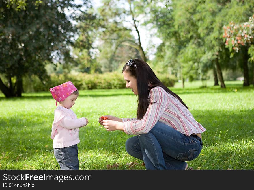 Happy family on green meadow. Happy family on green meadow