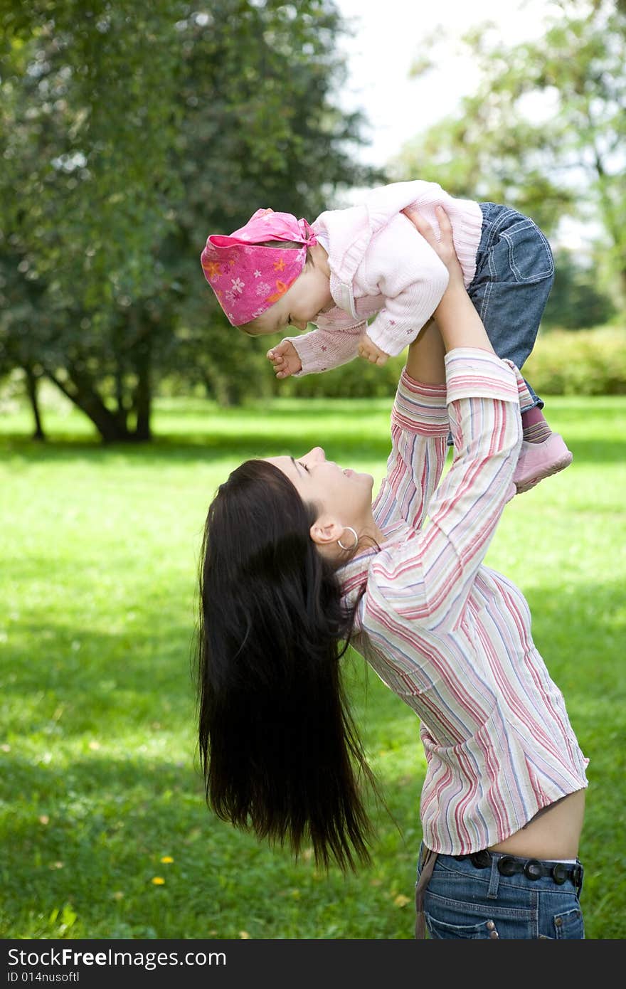 Happy family on green meadow. Happy family on green meadow