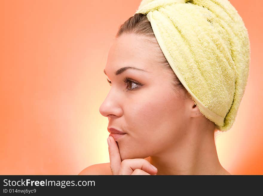 Attractive and fresh brunette woman on orange background. Attractive and fresh brunette woman on orange background