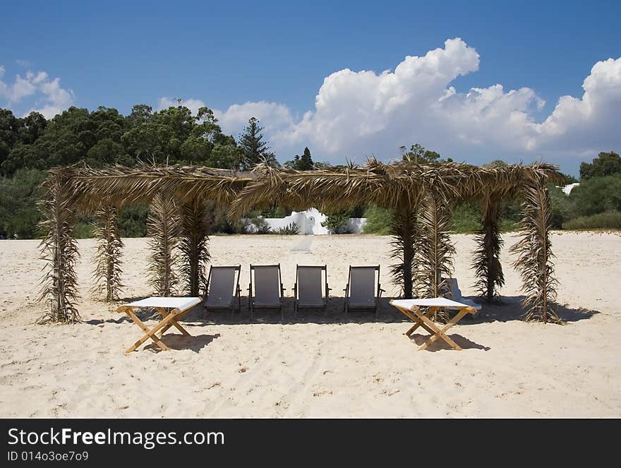 Canvas Chairs on tropical beach