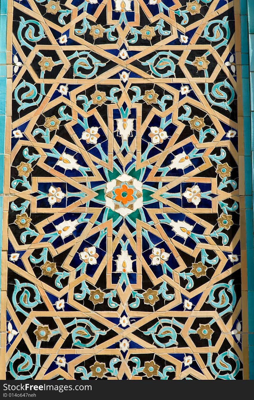 Traditional east ornament laid out from a multi-coloured mosaic