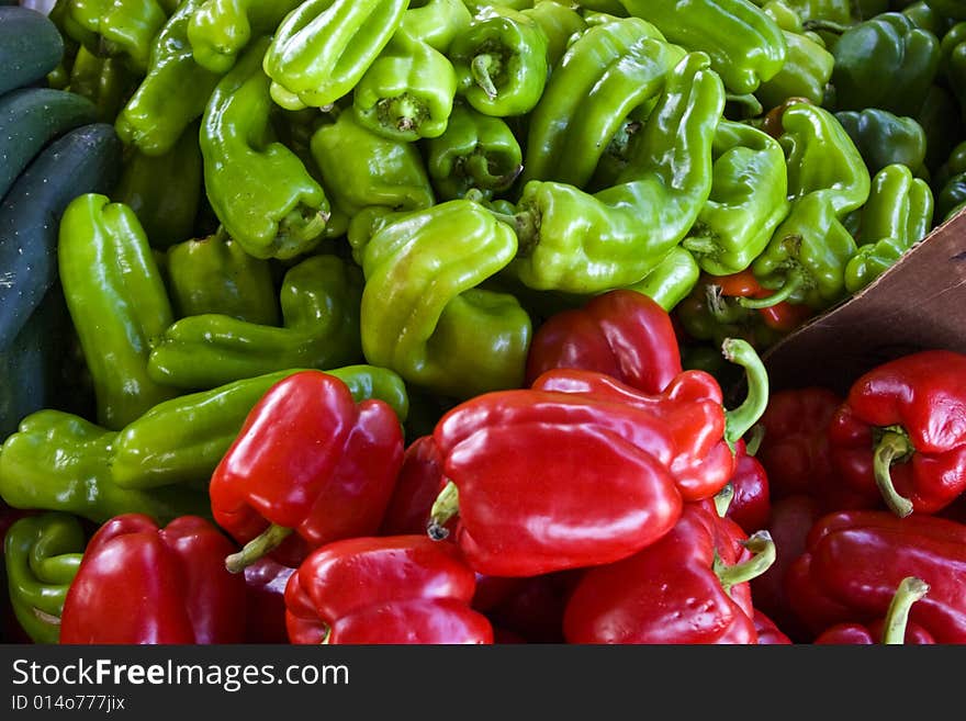 Bin of red & green hot peppers at a local farmers market.