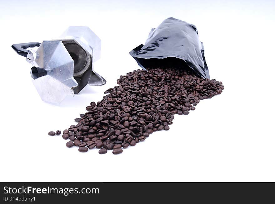 Coffee beans spilled from bag on white background. Coffee beans spilled from bag on white background