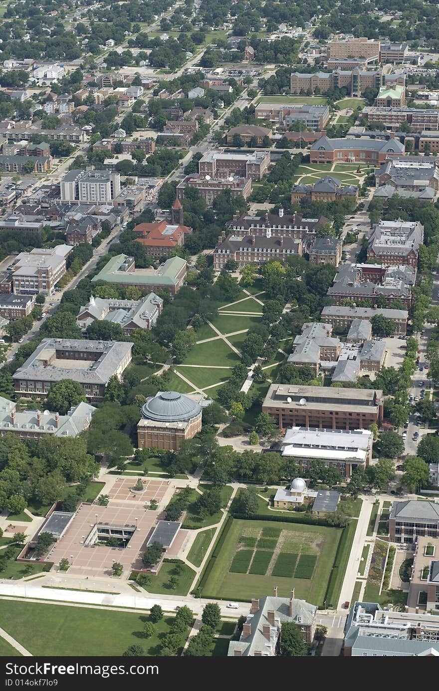 Vertical photo of a town with perfectly landscaped lawns. Vertical photo of a town with perfectly landscaped lawns