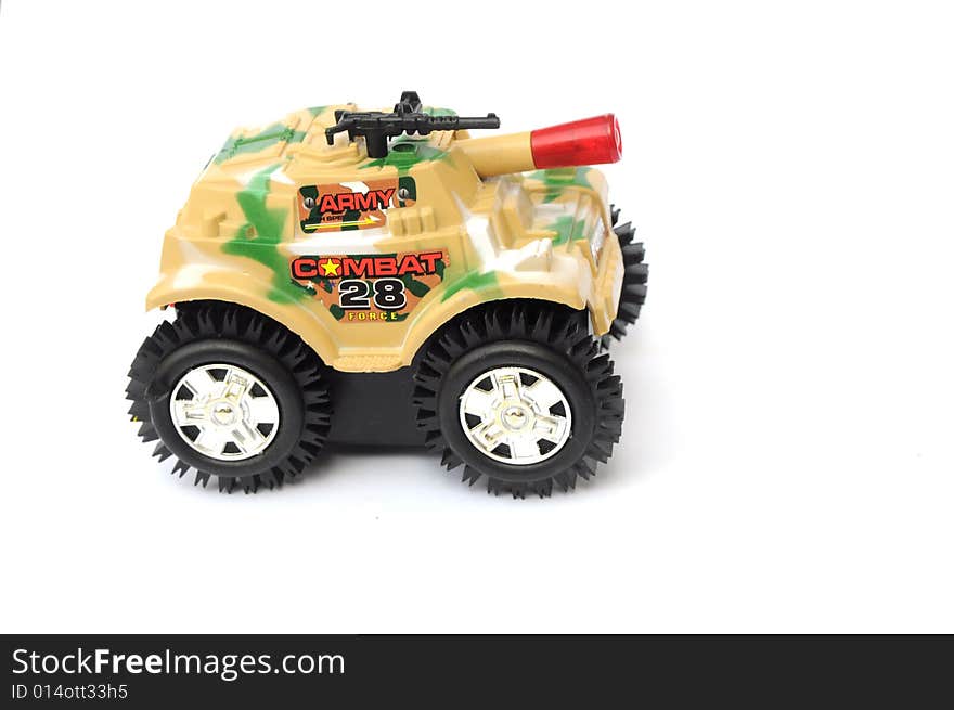 The colorful camouflage Plastic toy armored combat war vehicle. The colorful camouflage Plastic toy armored combat war vehicle.