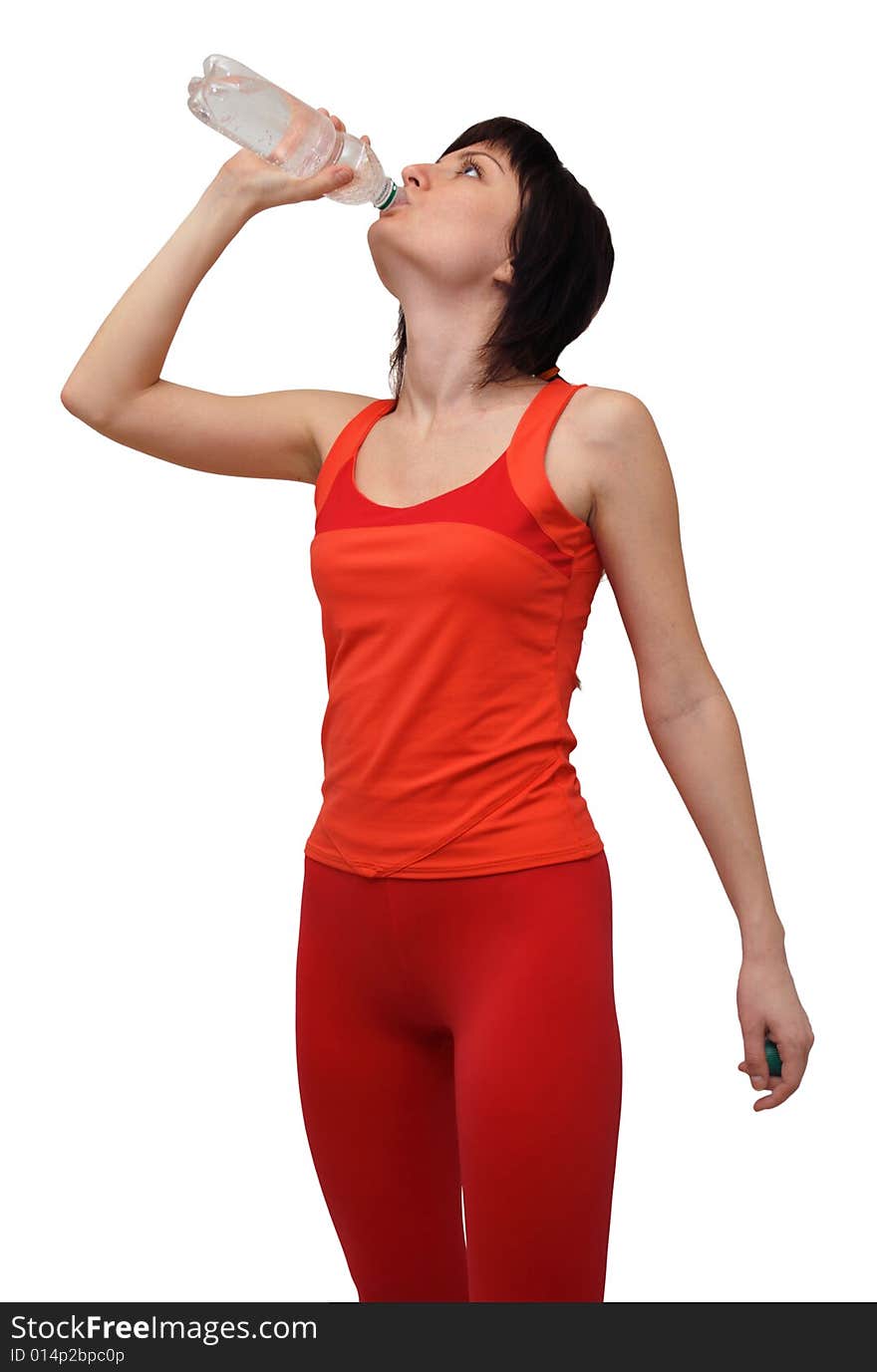 Woman in sports outfit drinking water isolated on white background