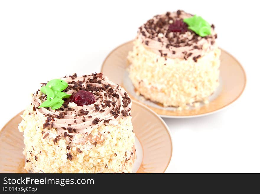 Two cakes isolated on a white background