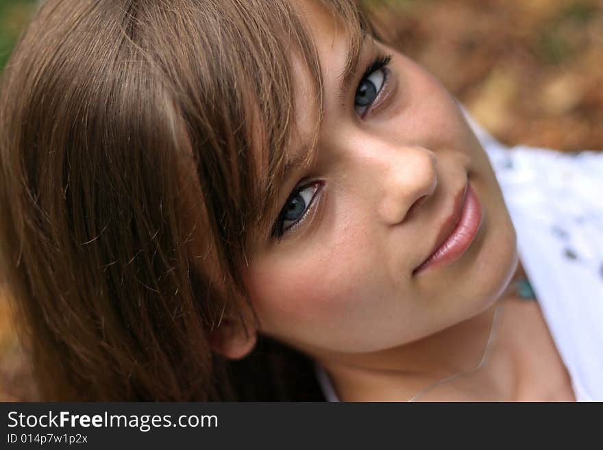 A Portrait Of The Gorgeous Girl On The Autumn Leaf