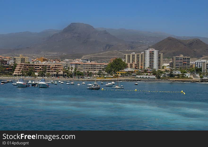 Small boats resting in a harbour of the coast of Tenerife. Small boats resting in a harbour of the coast of Tenerife