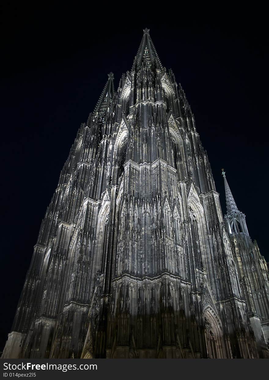 The night cathedral at Cologne, Germany against dark sky. The night cathedral at Cologne, Germany against dark sky.