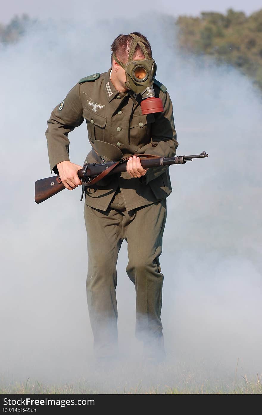 German Soldier In Gas Mask . WW2 Reenacting