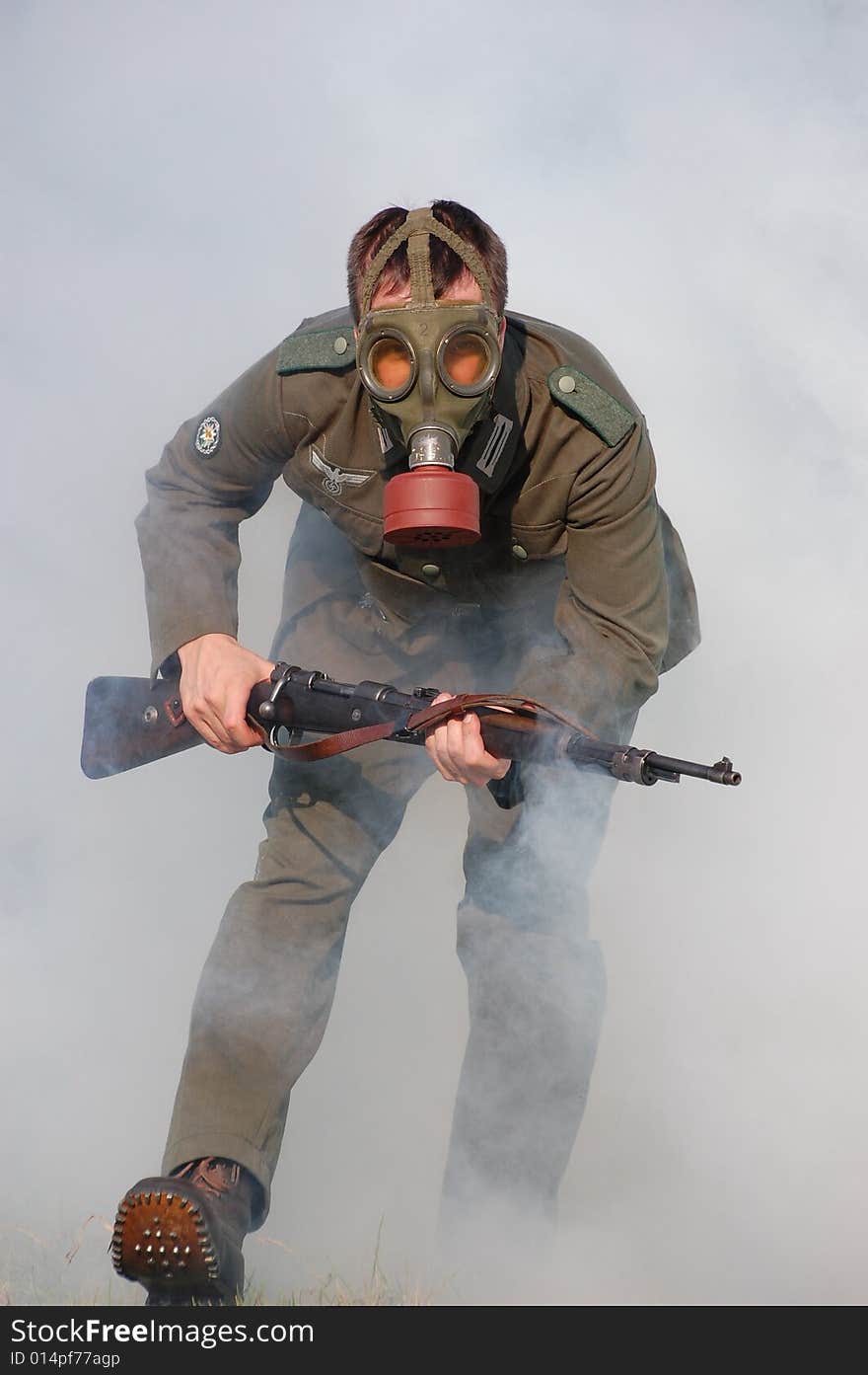 German soldier in gas mask . WW2 reenacting