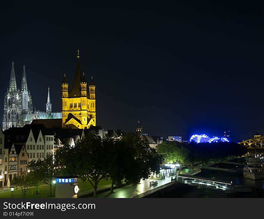 Night quay in Cologne with cathedral.