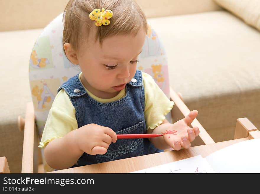 Sweet baby girl learning drawing. Sweet baby girl learning drawing