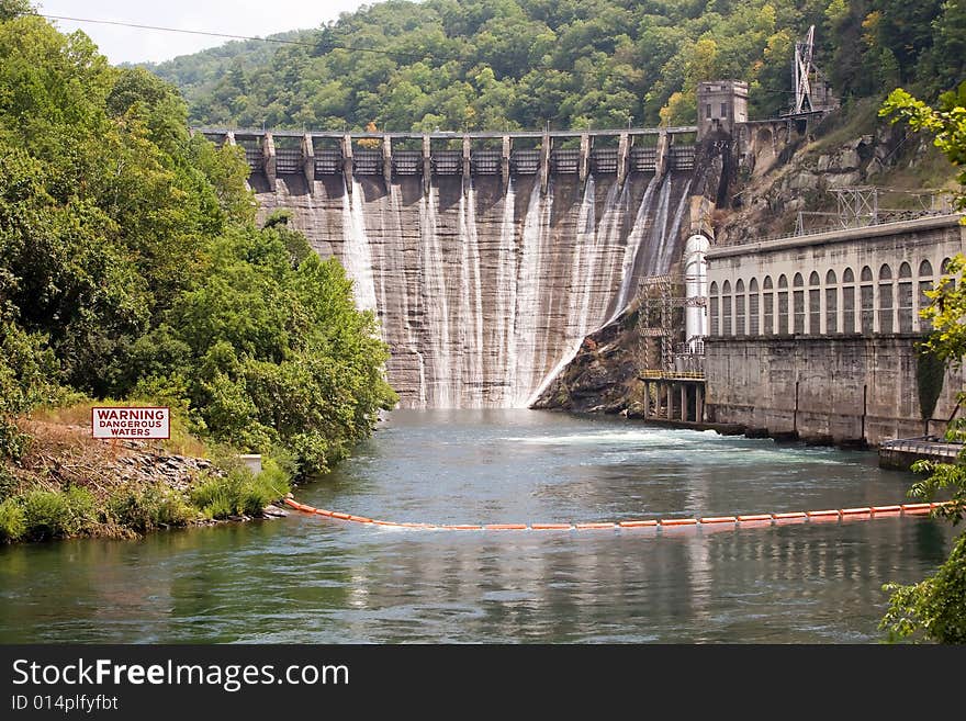 The flood gates of a dam just starting to open