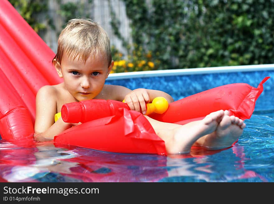 Boy in the swimming pool