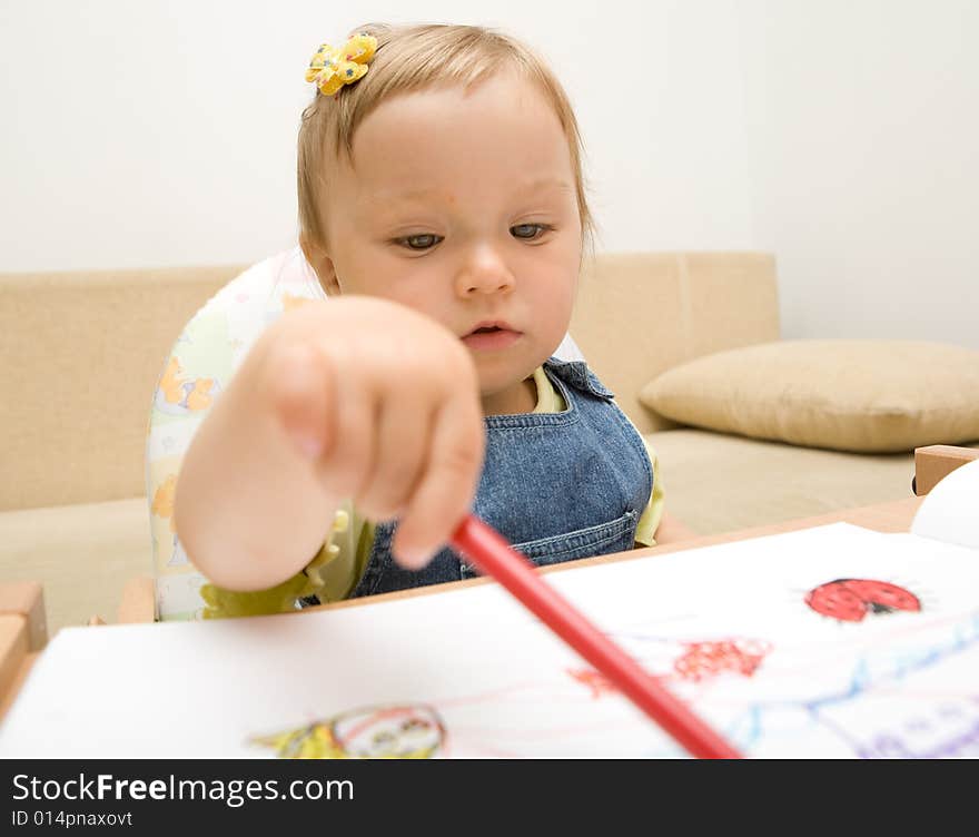 Sweet baby girl learning drawing. Sweet baby girl learning drawing