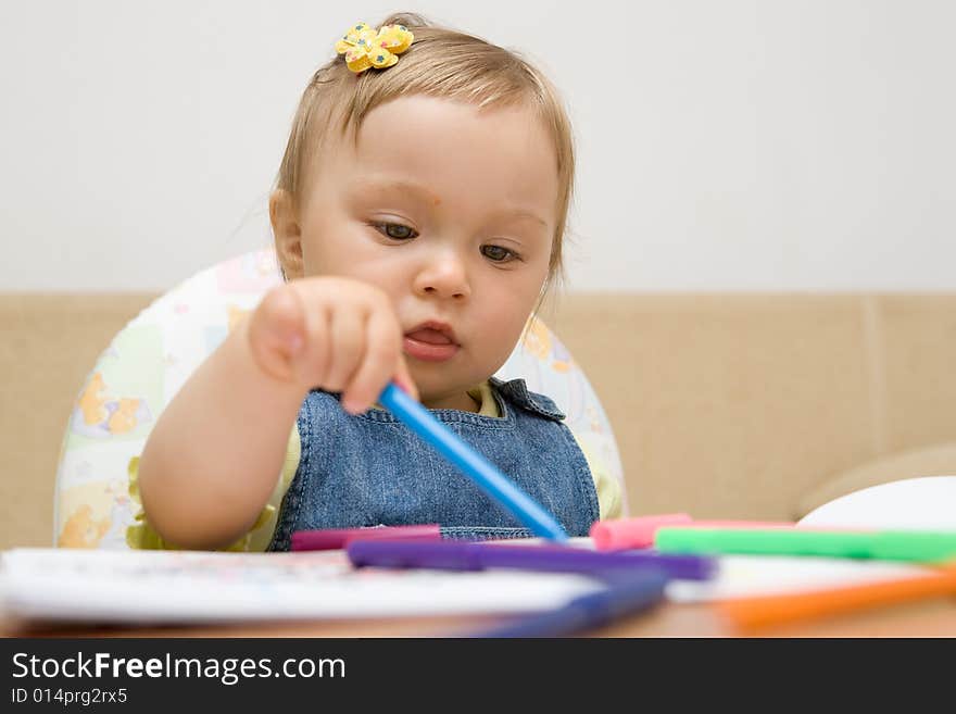 Sweet baby girl learning drawing. Sweet baby girl learning drawing