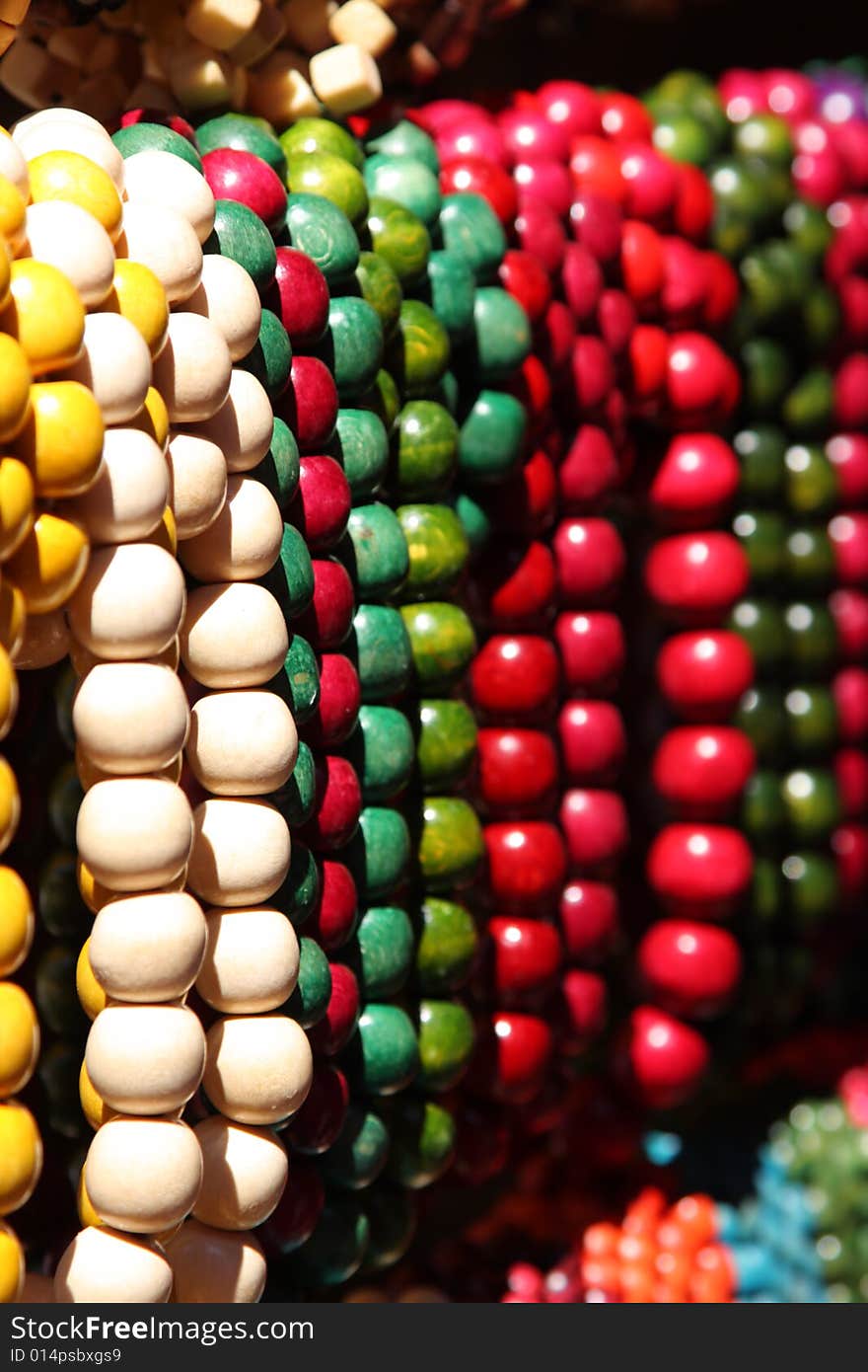 Abstract colorful bright wooden beads in street shop. Abstract colorful bright wooden beads in street shop