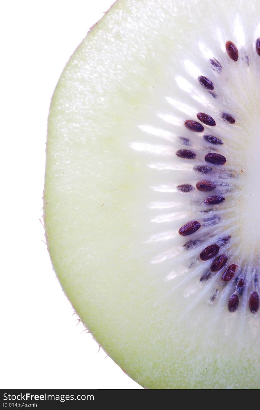 Close up of single kiwifruit slice.