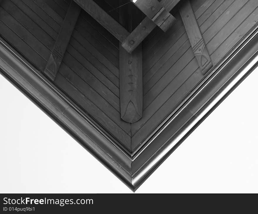This is a part of a roof of an ancient building. It is specifically shot that the image is divided into triangles. The lines are the most dominant ones. This is a part of a roof of an ancient building. It is specifically shot that the image is divided into triangles. The lines are the most dominant ones