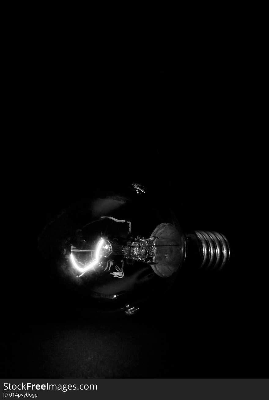 The bulb on dark background. The bulb on dark background