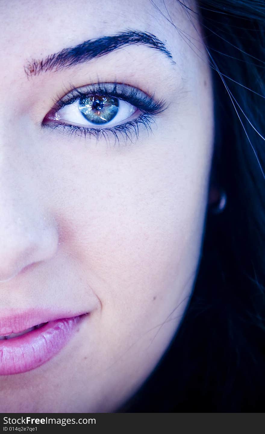 Half full woman portrait with amazing green eyes. Ice toned. Half full woman portrait with amazing green eyes. Ice toned.