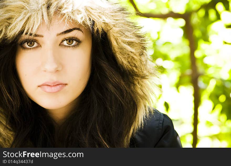 Woman portrait wearing a fur cap.