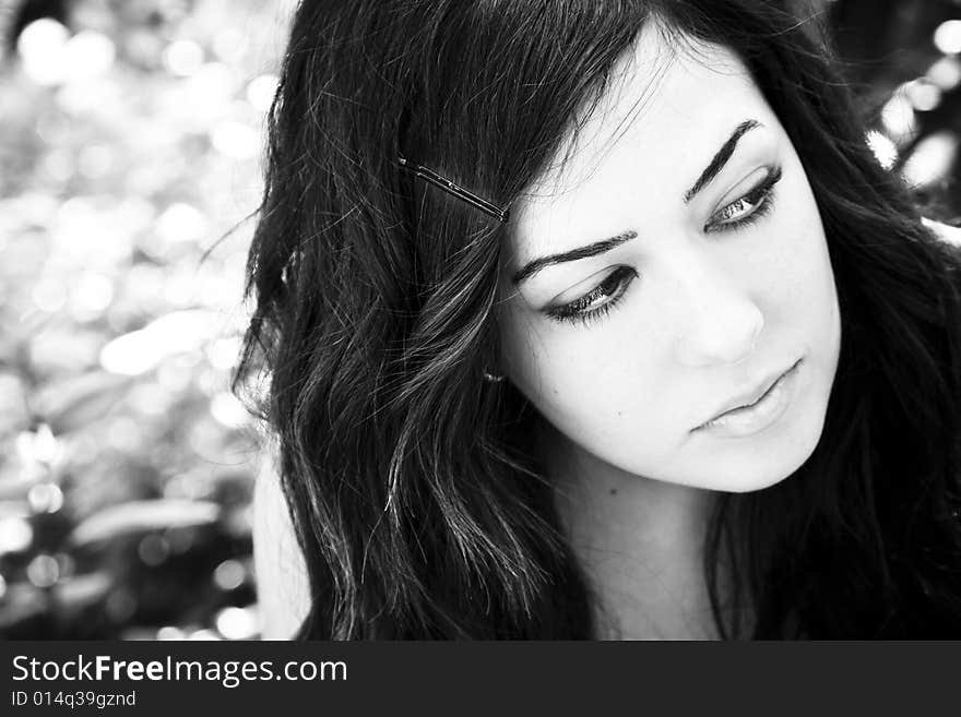 Young beautiful woman portrait in black and white. Young beautiful woman portrait in black and white.