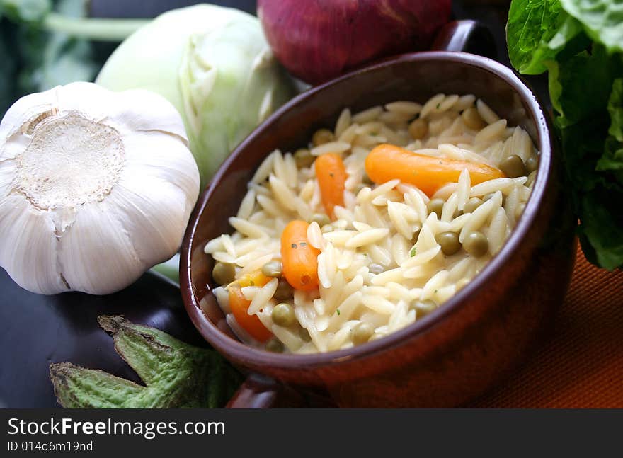 A meal of greg rice noodles with vegetables