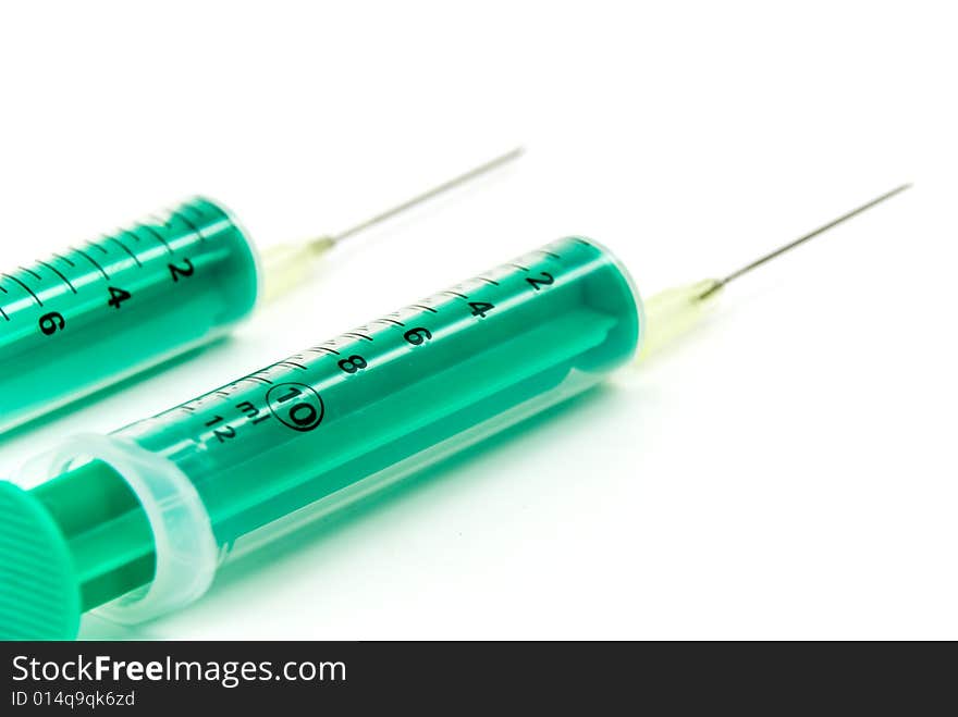 Two syringes - isolated on the white background.