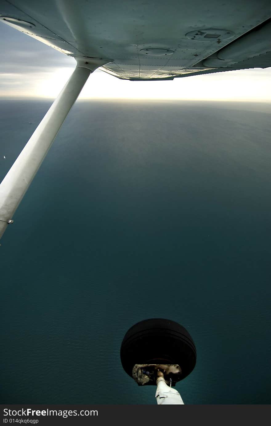 Amazing view of body of water from an airplane. Amazing view of body of water from an airplane